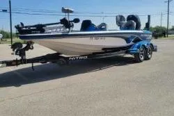 Slide: The Image of 2019 Nitro Z20 Pro fishing boat on trailer in parking lot. - 6