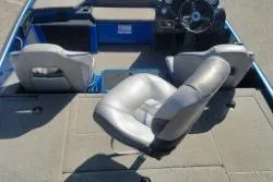 Slide: The Image of Interior of a 2019 Nitro Z20 Pro boat with gray seating and steering console. - 8