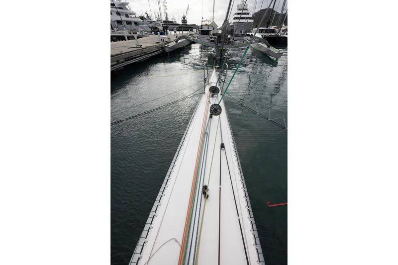 Slide: The Image of Top view of a 2012 CDK Technologies MOD 70 sailboat docked in a marina. - 22