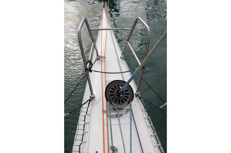 Slide: The Image of Bow of 2012 CDK Technologies MOD 70 sailboat with ropes and winch. - 24