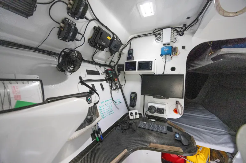 Slide: The Image of Control room of a 2012 CDK Technologies MOD 70 yacht with navigation equipment. - 39