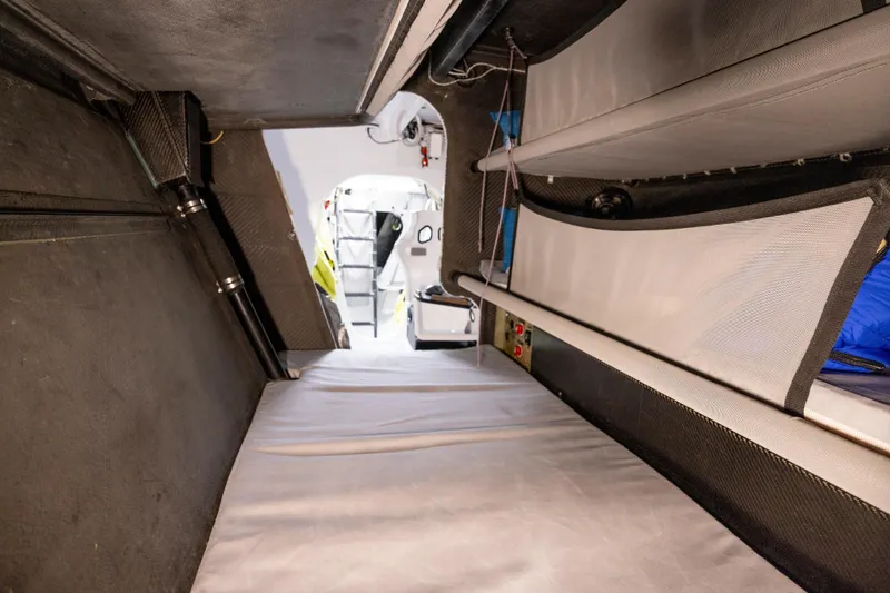 Slide: The Image of Interior of 2012 CDK Technologies MOD 70 yacht, featuring compact sleeping quarters. - 41