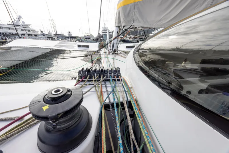 Slide: The Image of Deck view of 2012 CDK Technologies MOD 70 yacht with ropes and winch. - 48