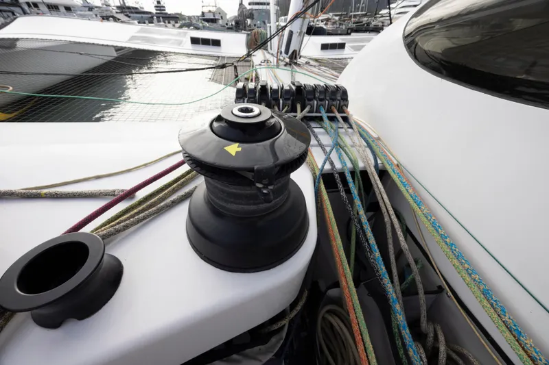 Slide: The Image of Close-up of CDK Technologies MOD 70 sailboat winch and colorful ropes, 2012 model. - 49