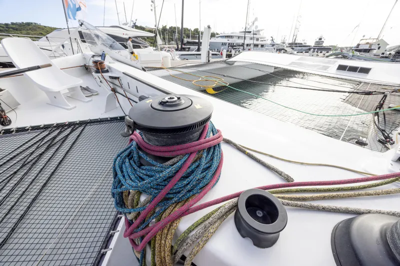 Slide: The Image of Deck of 2012 CDK Technologies MOD 70 yacht with ropes and winch. - 50