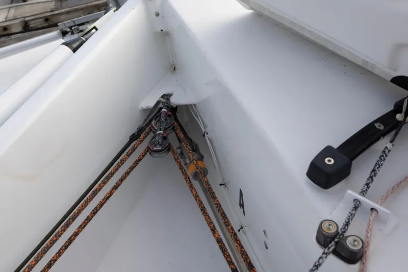Slide: The Image of Close-up of CDK Technologies MOD 70 sailboat rigging, showcasing ropes and pulleys, 2012 model. - 53
