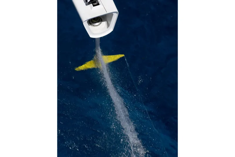 Slide: The Image of Aerial view of CDK Technologies MOD 70 yacht's hull and water spray, 2012. - 59
