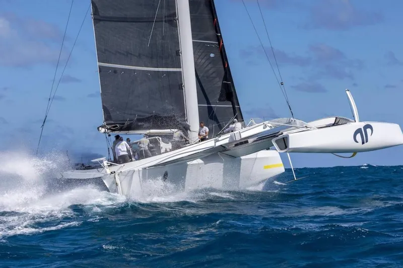 Slide: The Image of Sailing yacht CDK Technologies MOD 70, 2012 model, navigating ocean waves. - 6