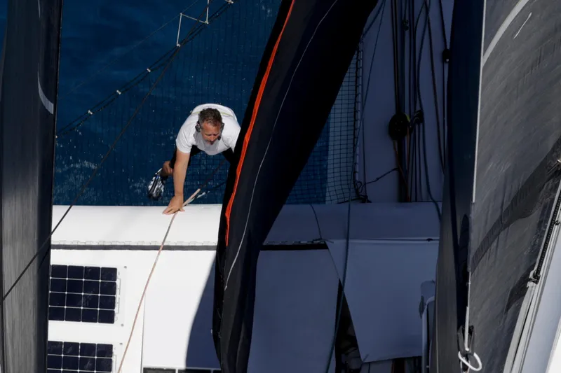 Slide: The Image of Man on CDK Technologies MOD 70 sailboat, 2012, navigating between sails. - 61