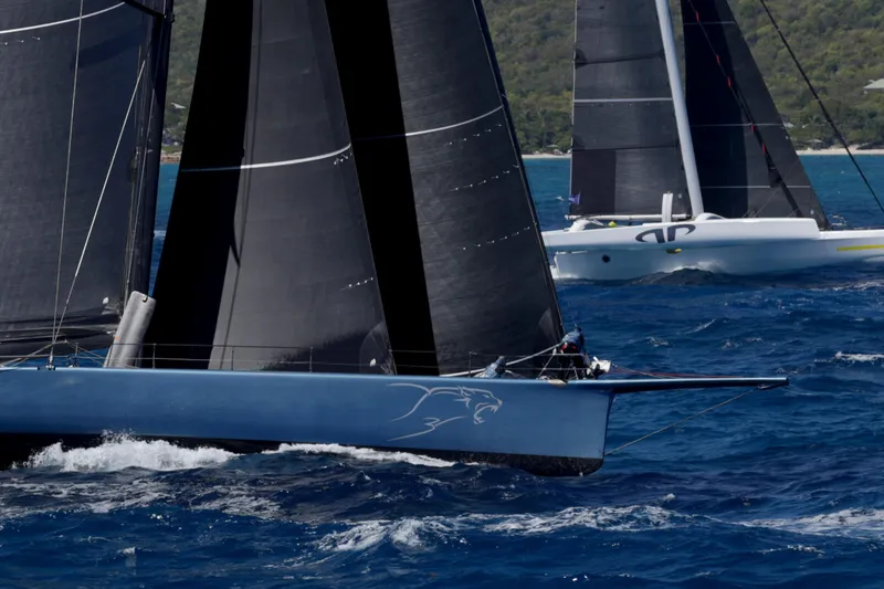 Slide: The Image of Sailing yachts racing on the ocean, featuring CDK Technologies MOD 70, 2012 model. - 67