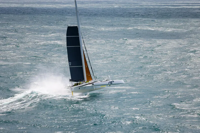Slide: The Image of Sailing yacht CDK Technologies MOD 70, 2012 model, navigating rough seas. - 68