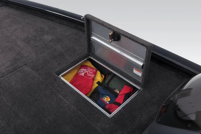 Slide: The Image of 2018 Tracker Pro Team 190 TX boat with storage compartment. - 17