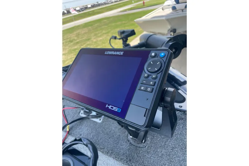 Slide: The Image of Lowrance HDS9 fishfinder on 2018 Tracker Pro Team 190 TX boat dashboard. - 2