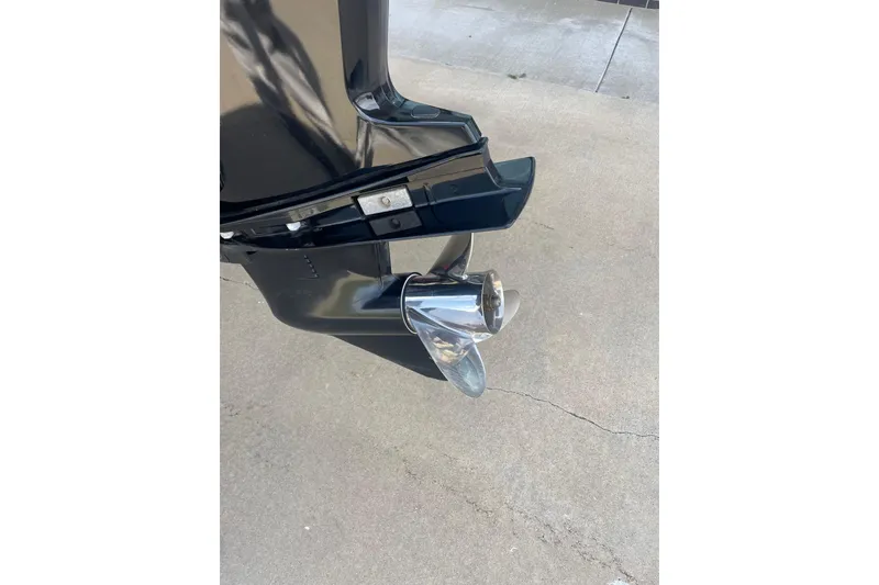 Slide: The Image of 2018 Tracker Pro Team 190 TX boat propeller on concrete surface. - 37