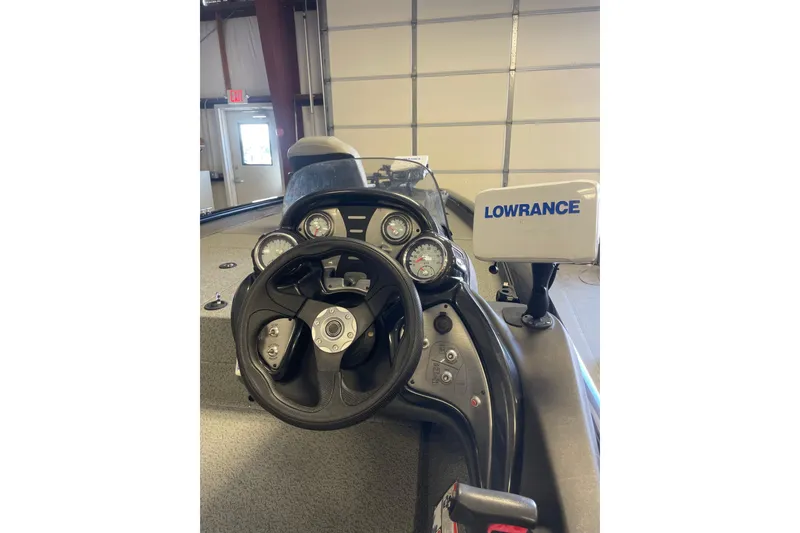 Slide: The Image of 2018 Tracker Pro Team 190 TX boat dashboard with Lowrance navigation system. - 8
