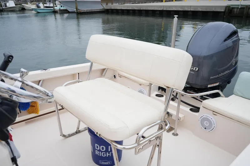 Slide: The Image of 2019 Grady-White Fisherman 180 boat interior with Yamaha outboard motor. - 14