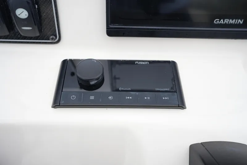 Slide: The Image of Control panel on 2019 Grady-White Fisherman 180 boat with Fusion audio system. - 18