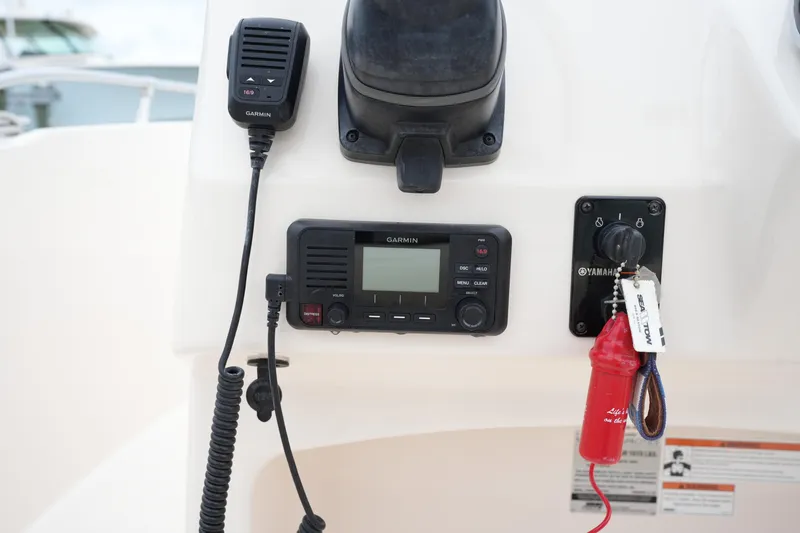 Slide: The Image of Control panel of a 2019 Grady-White Fisherman 180 boat with Garmin radio and Yamaha ignition. - 20