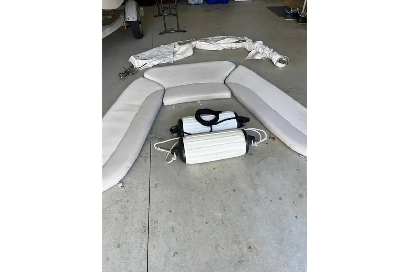 Slide: The Image of 2005 Boston Whaler 320 Outrage helm with steering wheel and navigation equipment. - 16
