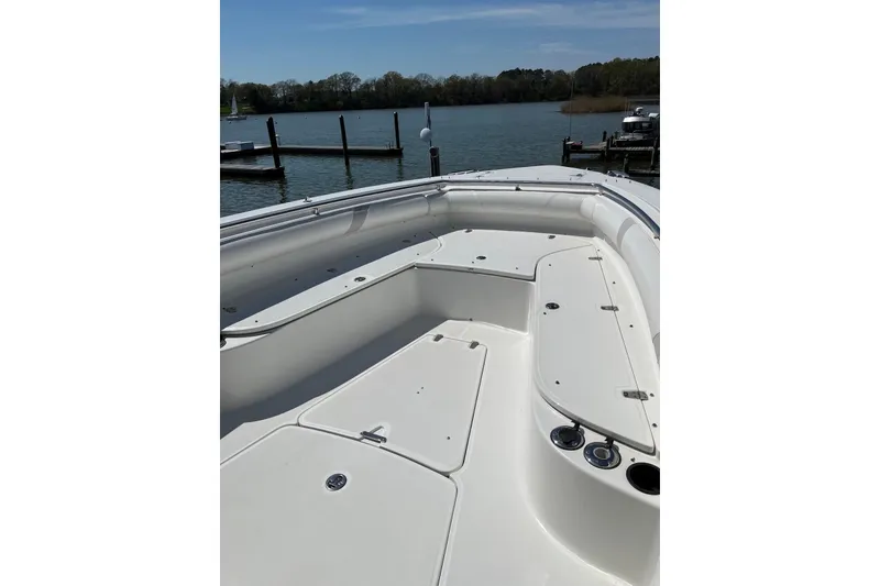 Slide: The Image of 2005 Boston Whaler 320 Outrage boat interior with seating and ocean view. - 6