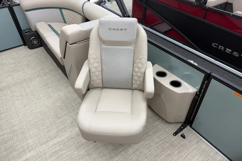 Slide: The Image of Luxurious seating on 2026 Crest Conquest 230 SLC boat with cup holders and elegant design. - 10