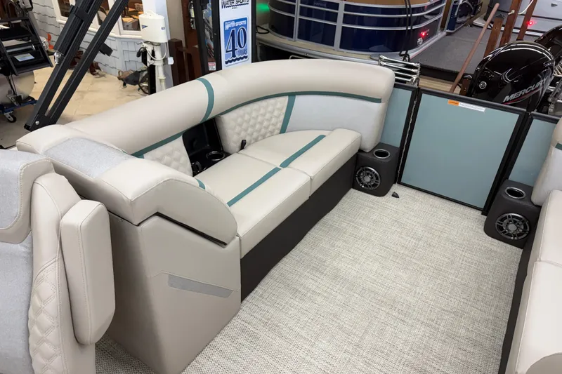 Slide: The Image of Luxurious seating on the 2026 Crest Conquest 230 SLC pontoon boat, featuring modern design. - 12