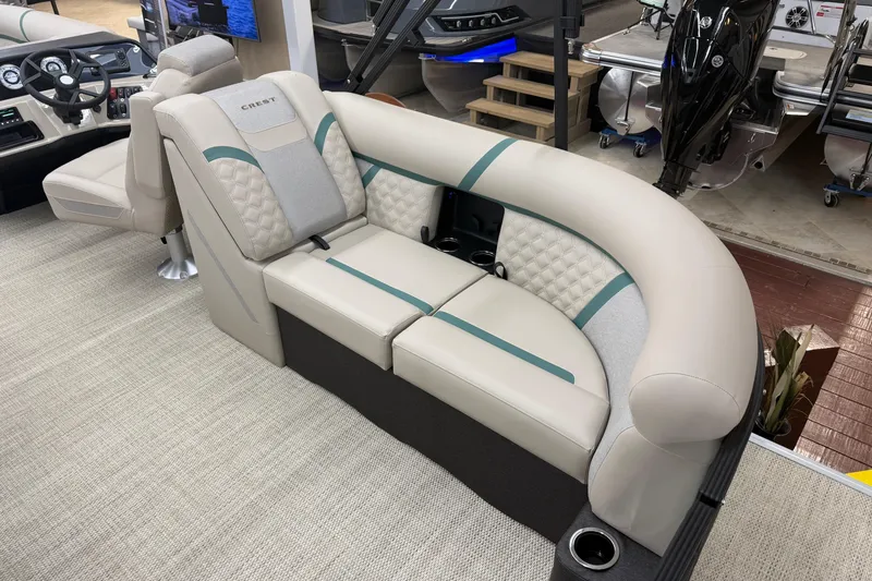 Slide: The Image of Luxurious seating on the 2026 Crest Conquest 230 SLC pontoon boat, featuring elegant upholstery. - 13