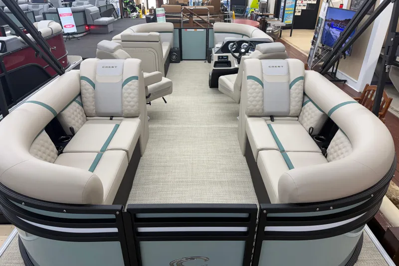 Slide: The Image of 2026 Crest Conquest 230 SLC pontoon boat interior with luxurious seating and modern design. - 15