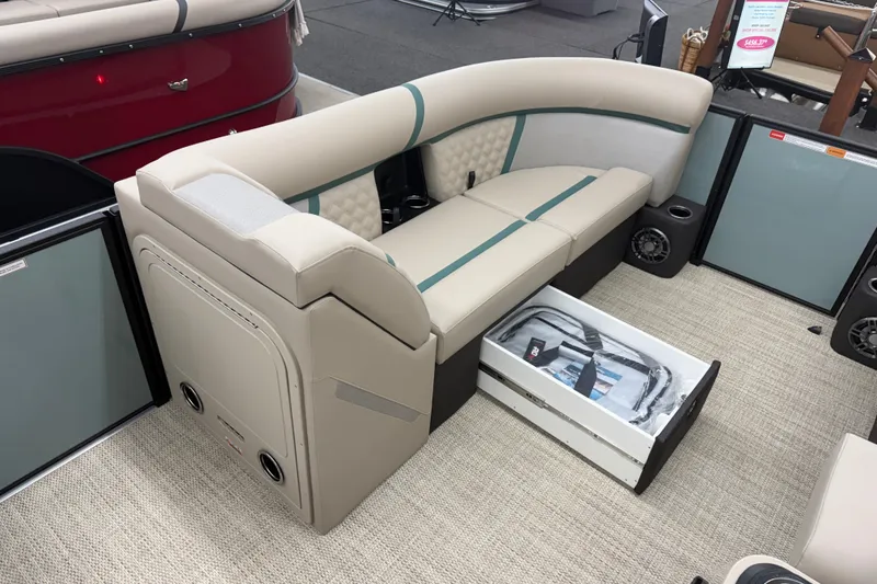 Slide: The Image of Luxurious seating on the 2026 Crest Conquest 230 SLC pontoon boat with storage drawer. - 7