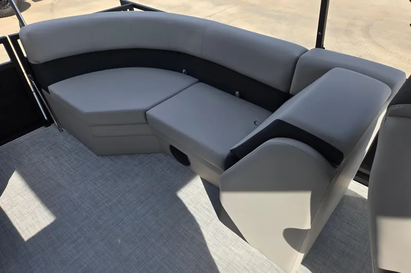 Slide: The Image of Luxurious seating on 2026 Dockside 22DQ2.75 boat, featuring sleek gray upholstery. - 11