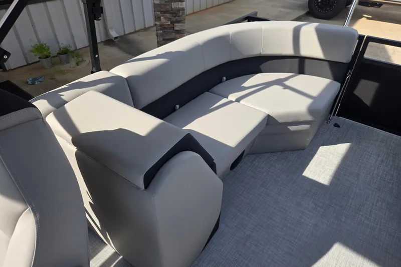 Slide: The Image of Luxurious seating on 2026 Dockside 22DQ2.75 boat, featuring modern gray upholstery. - 12