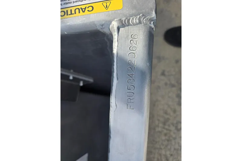 Slide: The Image of Close-up of Dockside 22DQ2.75 model, serial number FRU58422D626, with caution label. - 18