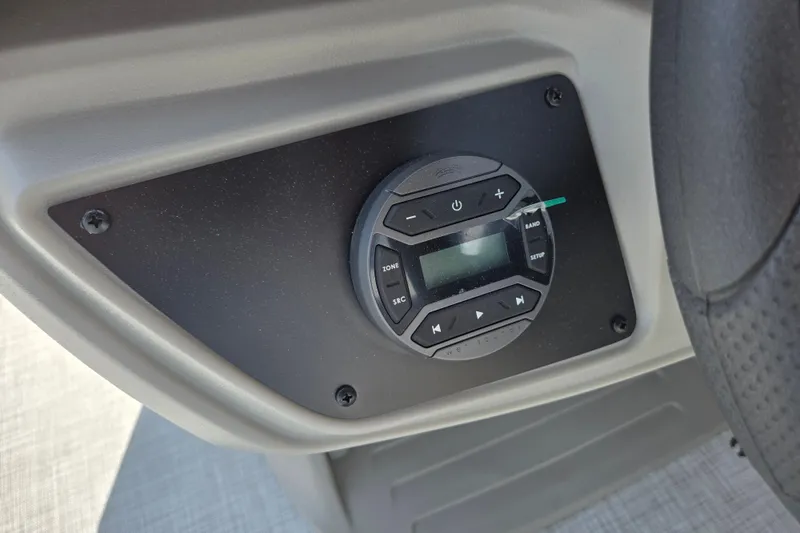 Slide: The Image of Control panel of Dockside 22DQ2.75 boat, 2026 model, featuring audio system interface. - 6