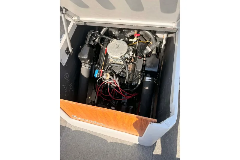 Slide: The Image of 1984 Century Resorter engine compartment with visible mechanical components and wiring. - 3