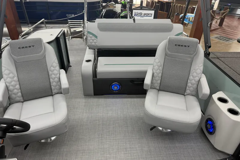 Slide: The Image of Interior of 2026 Crest Conquest 230 SLSC with luxurious seating and modern design. - 11