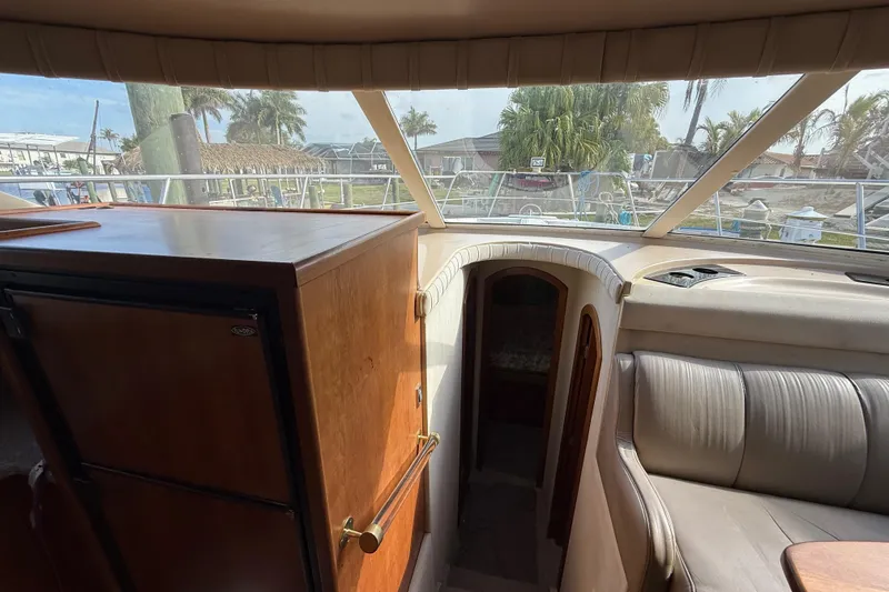 Slide: The Image of Interior view of 2002 Cruisers Yachts 4450 Express Motoryacht with seating and cabinetry. - 30