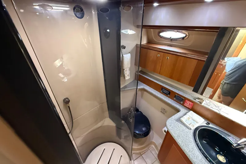 Slide: The Image of Luxurious bathroom in 2002 Cruisers Yachts 4450 Express Motoryacht with modern amenities. - 34