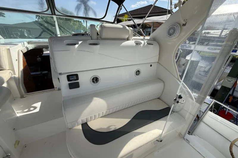 Slide: The Image of 2002 Cruisers Yachts 4450 Express Motoryacht interior with white seating and modern design. - 45