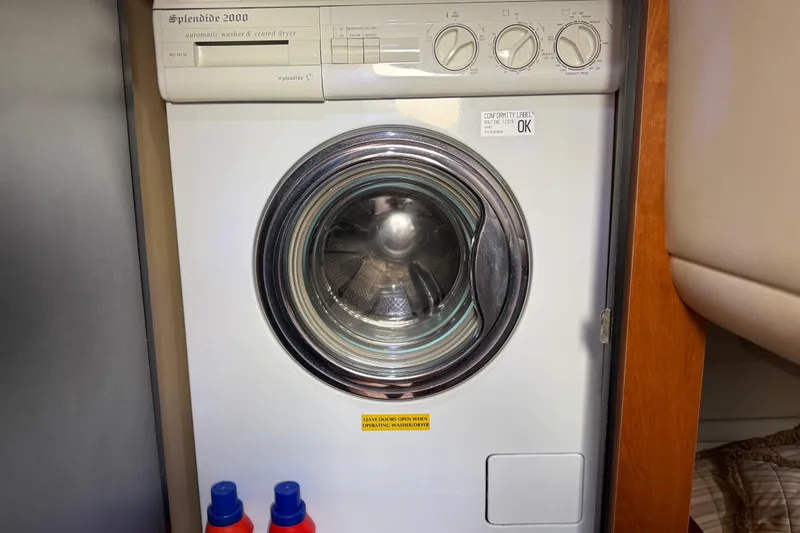 Slide: The Image of Splendide 2000 washer-dryer in 2002 Cruisers Yachts 4450 Express Motoryacht. - 49