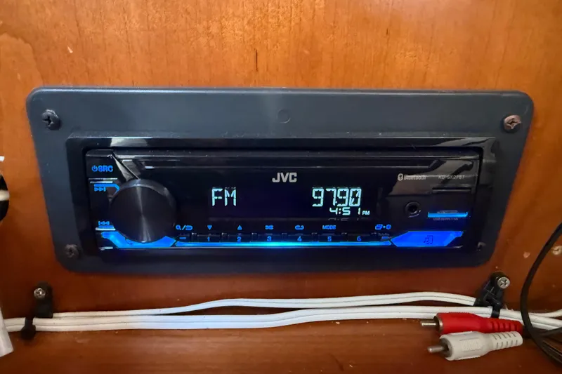 Slide: The Image of JVC car stereo displaying FM 97.9, installed in a 2002 Cruisers Yachts 4450 Express Motoryacht. - 57