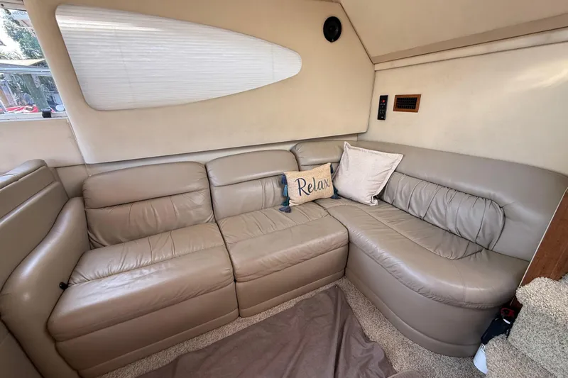 Slide: The Image of Luxurious leather seating in 2002 Cruisers Yachts 4450 Express Motoryacht interior. - 62