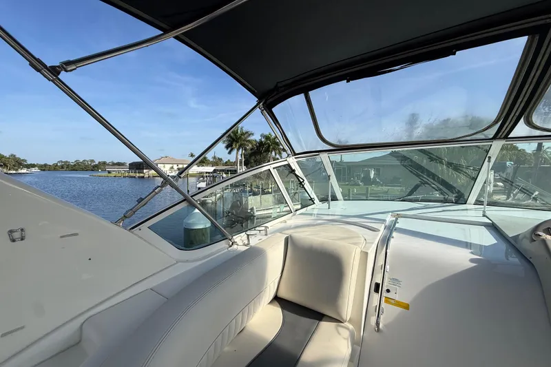 Slide: The Image of 2002 Cruisers Yachts 4450 Express Motoryacht interior with waterfront view. - 67