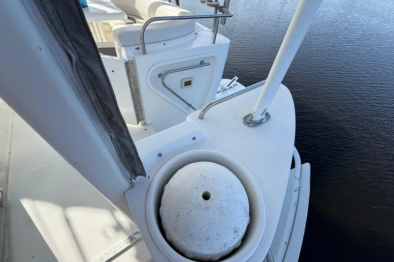 Slide: The Image of 2002 Cruisers Yachts 4450 Express Motoryacht deck view with seating and railing. - 73