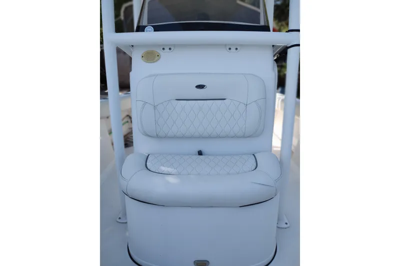 Slide: The Image of 2020 Sportsman Heritage 211 Center Console boat seat with white quilted upholstery. - 35