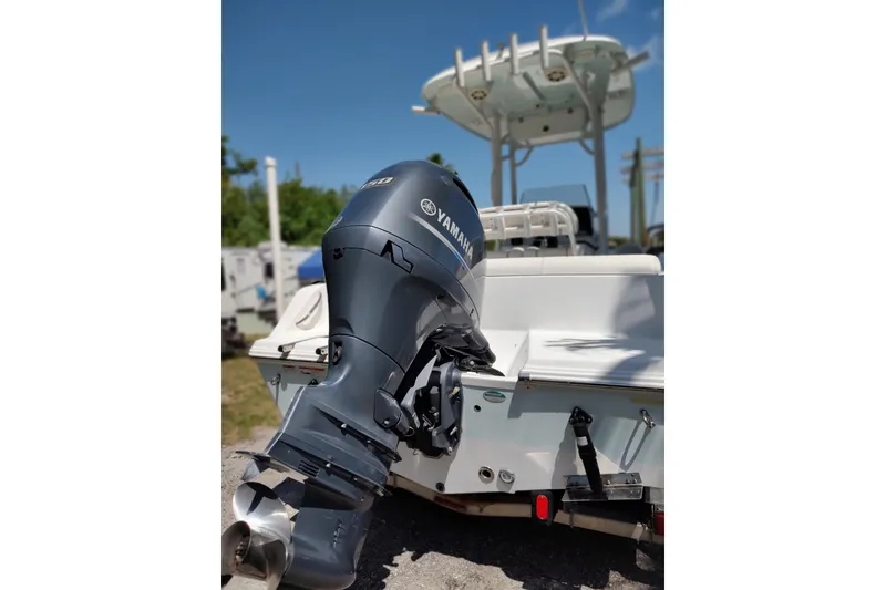 Slide: The Image of 2020 Sportsman Heritage 211 Center Console boat with Yamaha outboard motor. - 4