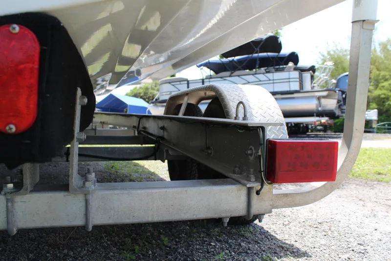Slide: The Image of Trailer for 2020 Sportsman Heritage 211 Center Console boat, featuring red tail light. - 48