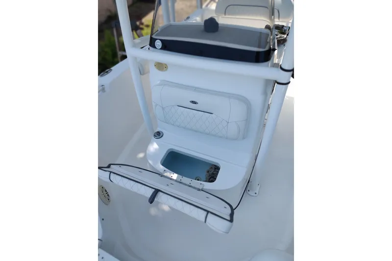 Slide: The Image of 2020 Sportsman Heritage 211 Center Console interior with storage and seating. - 5