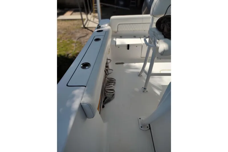Slide: The Image of 2020 Sportsman Heritage 211 Center Console interior with seating and storage compartments. - 7