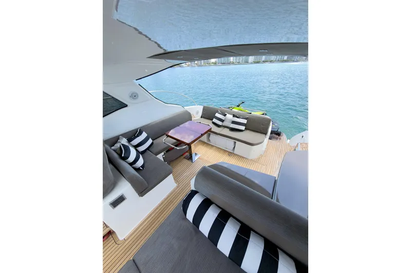 Slide: The Image of Luxurious 2018 Azimut Atlantis 43 yacht interior with stylish seating and ocean view. - 16