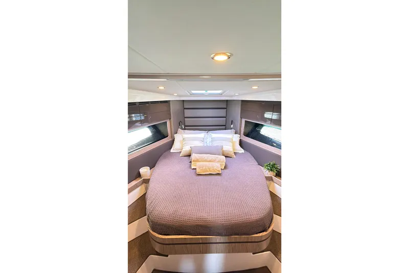Slide: The Image of Luxurious bedroom interior of 2018 Azimut Atlantis 43 yacht with elegant bedding and modern design. - 17
